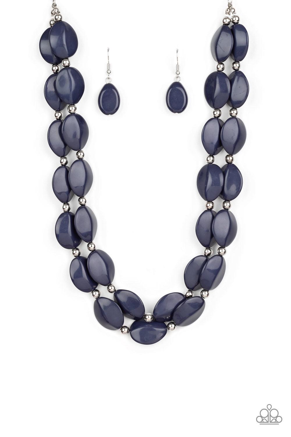 Paparazzi Accessories Two-Story Stunner - Blue Two rows of dainty silver beads and faceted Blue Depths faux stone beads alternate along invisible wires below the collar, creating bold, colorful layers. Features an adjustable clasp closure. Sold as one ind