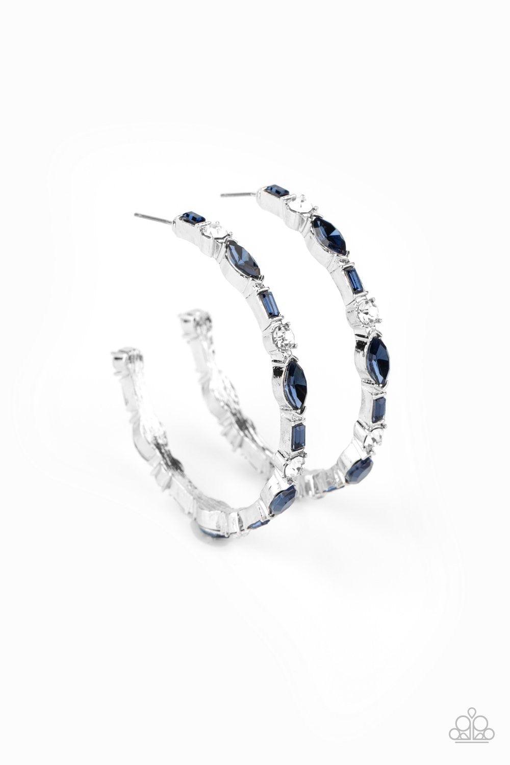 Paparazzi Accessories There Goes The Neighborhood - Blue Featuring round, emerald, and marquise style cuts, a glittery collection of blue and white rhinestones coalesce into a sparkly hoop for a glamorous finish. Earring attaches to a standard post fittin