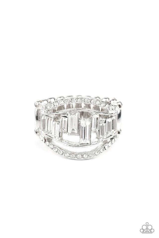 Paparazzi Accessories Treasure Chest Charm - White White rhinestone encrusted bands flank a row of emerald cut glass beads in shades of white for a regal look. Features a stretchy band for a flexible fit. Sold as one individual ring. Jewelry