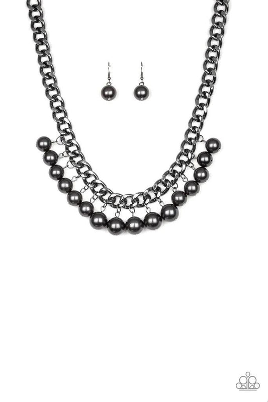 Paparazzi Accessories Get Off My Runway - Black Pearly gunmetal beads swing from the bottom of a hefty gunmetal chain, creating a dramatic fringe below the collar. Features an adjustable clasp closure. Sold as one individual necklace. Includes one pair of