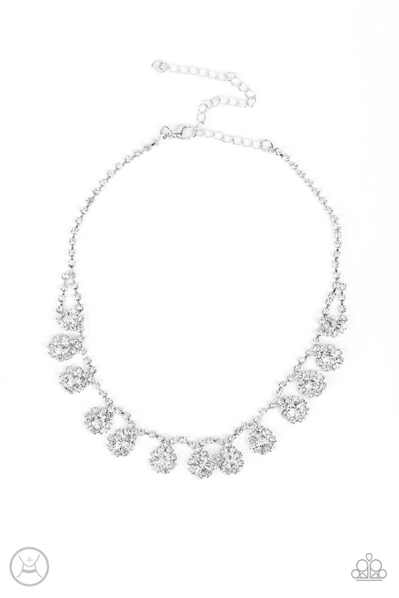 Paparazzi Accessories Princess Prominence - White A dainty strand of glittery white rhinestones encircle solitaire white rhinestones around the neck, creating a glitzy fringe. Features an adjustable clasp closure. Sold as one individual choker necklace. I