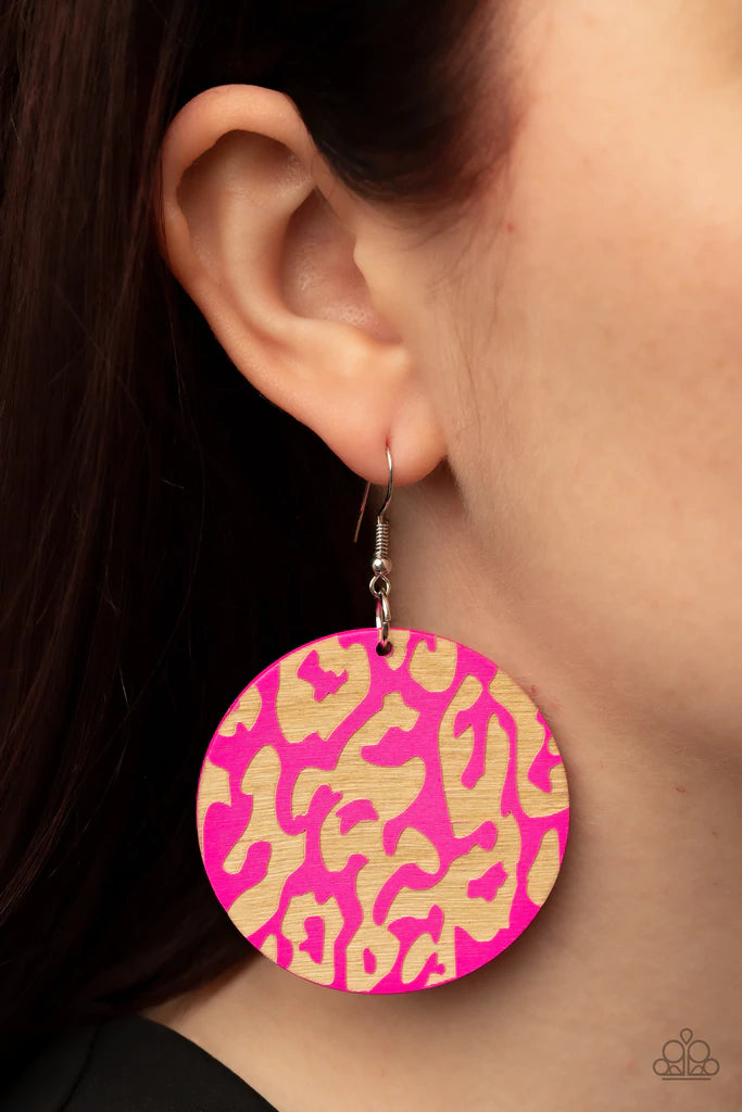 Paparazzi Accessories Catwalk Safari - Pink The front of a Fuchsia Fedora wooden disc is chiseled away, revealing a colorful cheetah-like pattern for a wild fashion. Earring attaches to a standard fishhook fitting. Sold as one pair of earrings. Jewelry