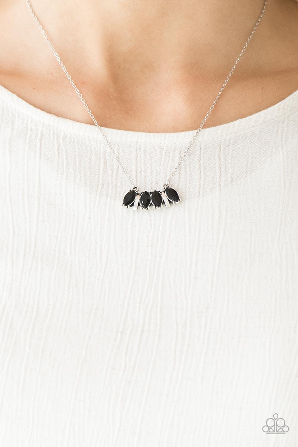 Paparazzi Accessories Deco Decadence - Black Featuring elegant marquise style cuts, glittery black rhinestones join with silver accents below the collar, creating a dainty pendant. Features an adjustable clasp closure. Sold as one individual necklace. Inc