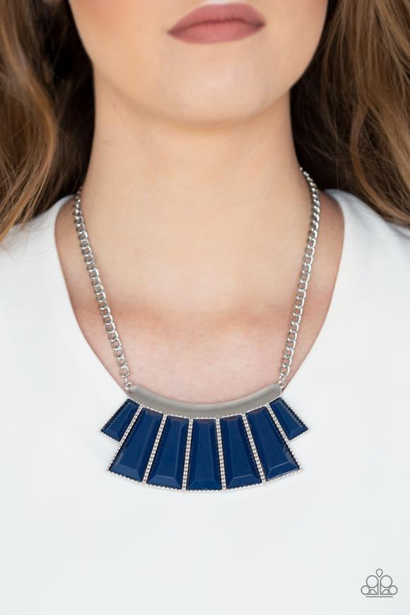Paparazzi Accessories Glamour Goddess - Blue Featuring the deep shade of Evening Blue, faceted emerald style beads are pressed into a hammered silver plate. Featuring flared bottoms, the colorful beads fan out below the collar for a fierce finish. Feature