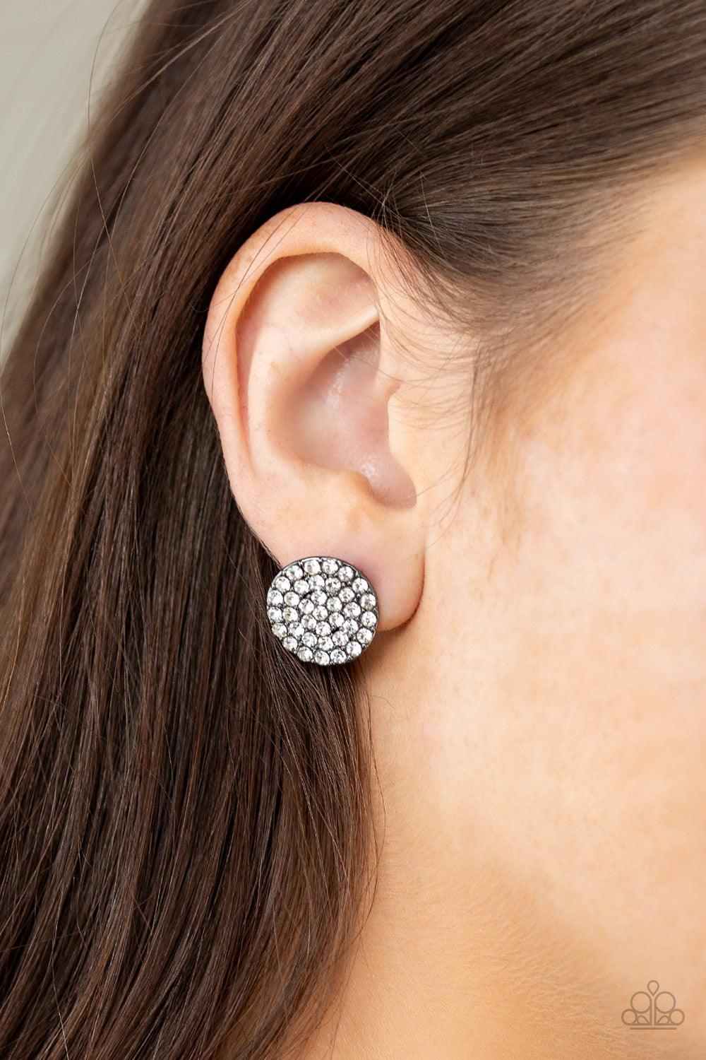 Paparazzi Accessories Greatest of All Time - Black Countless white rhinestones are encrusted across the front of a beveled gunmetal frame for a show-stopping look. Earring attaches to a standard post fitting. Sold as one pair of post earrings. Jewelry