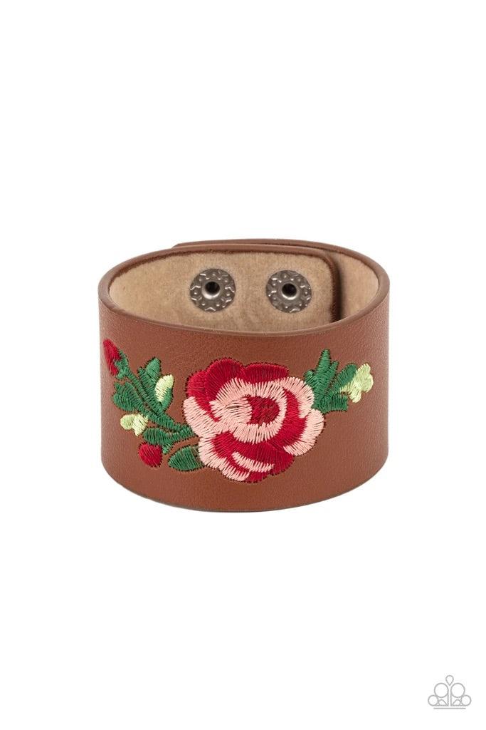 Paparazzi Accessories Rebel Rose ~Brown A leafy rose is embroidered across the center of a thick leather band, adding a hint of girly girl glam to the seasonal centerpiece. Features an adjustable snap closure. Sold as one individual bracelet. Jewelry