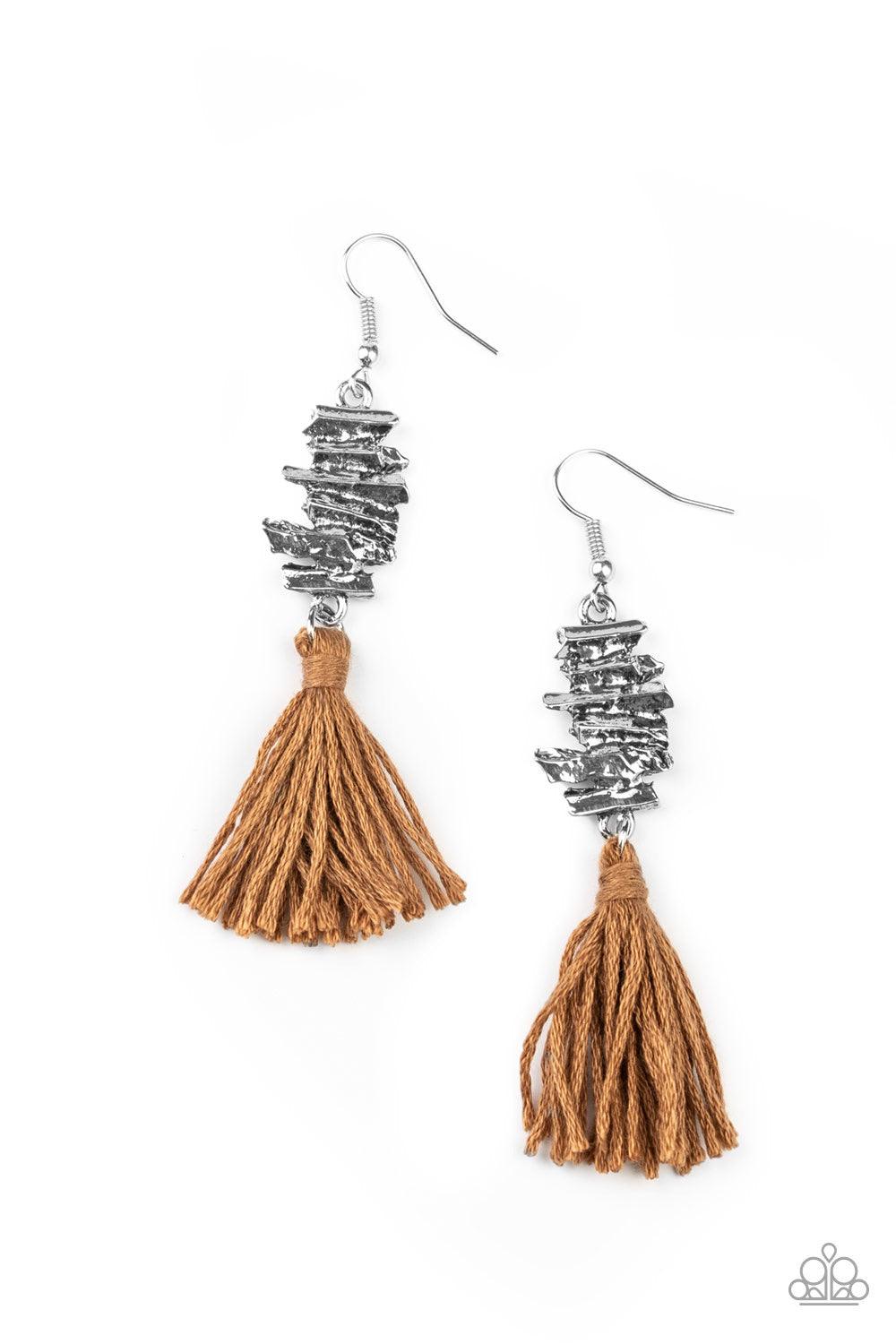 Paparazzi Accessories Tiki Tassel - Brown An earthy brown threaded tassel swings from the bottom of an abstractly stacked silver frame, creating a colorful fringe. Earring attaches to a standard fishhook fitting. Jewelry