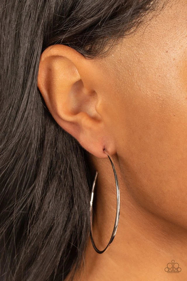 Paparazzi Accessories Can I Get a HOOP HOOP - Silver A glistening silver wire boldly curls into an oversized hoop, creating a minimalist inspired fashion. Earring attaches to a post fitting. Hoop measures approximately 2" in diameter. Jewelry
