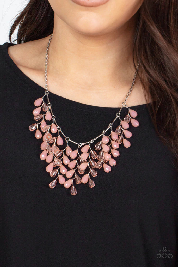 Paparazzi Accessories Garden Fairytale - Pink A shimmery collection of opaque and clear crystal-like Pale Rosette teardrop beads delicately cluster along a linked strand of silver bars, creating an ethereally leafy fringe below the collar. Features an adj
