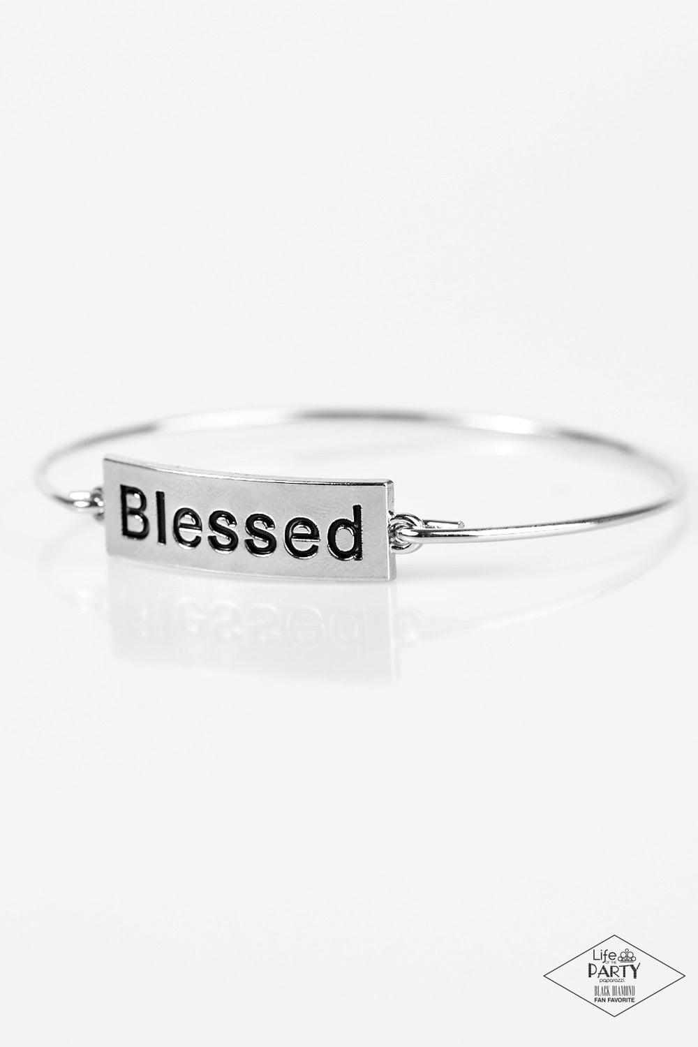 Paparazzi Accessories Blessed - Silver Engraved with the inspiring word "Blessed", a shimmery silver plate attaches to a skinny silver bar, creating a dainty bangle. Jewelry