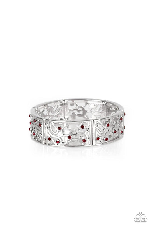 Paparazzi Accessories Yours and Vine - Red Filled with vine-like filigree, shimmery silver frames are threaded along stretchy bands around the wrist for a whimsical look. Dainty red rhinestones are sprinkled along the ornate frames for a sparkling finish.