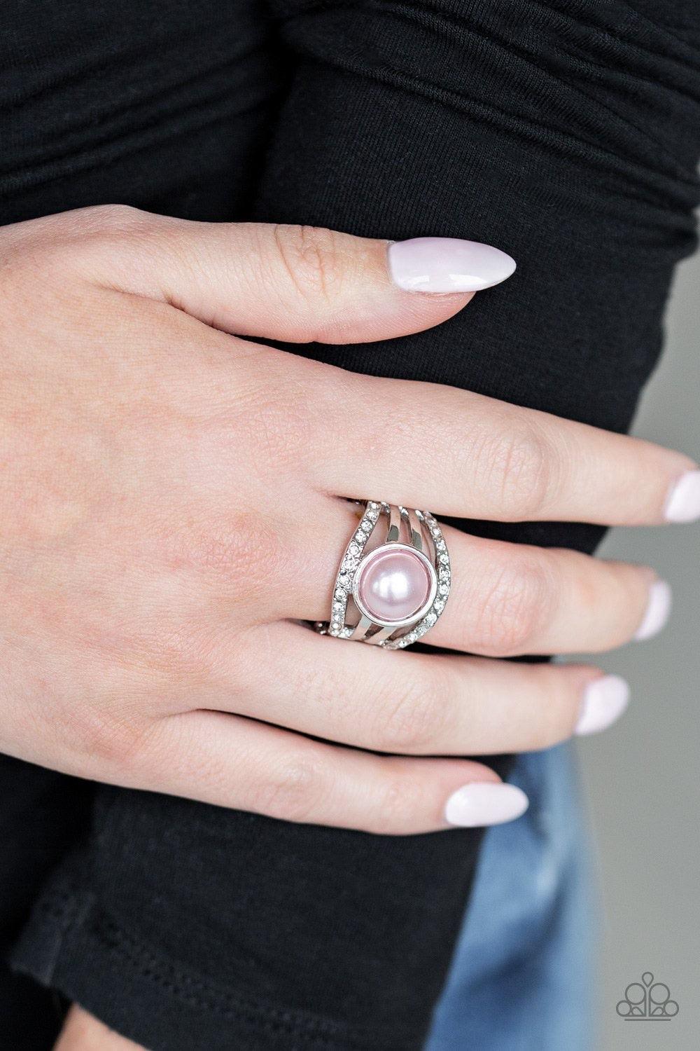 Paparazzi Accessories A Big Break - Pink Radiating with glassy white rhinestones, row after row of glittering silver bars arc across the finger. A pearly pink bead is pressed into the center of the layered bands, adding a dramatically refined finish to th