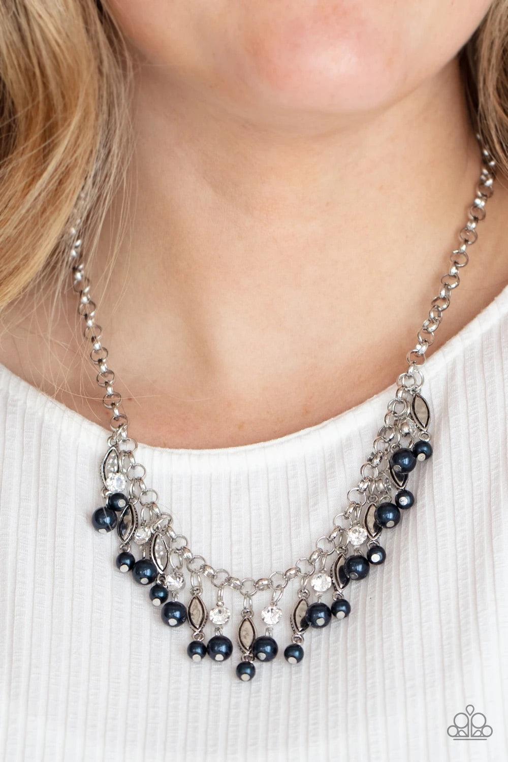 Paparazzi Accessories Cosmopolitan Couture - Blue Bubbly blue pearls swing from the bottoms of glittery white rhinestones and studded silver frames that alternate along a chunky silver chain, creating a glamorous fringe below the collar. Features an adjus