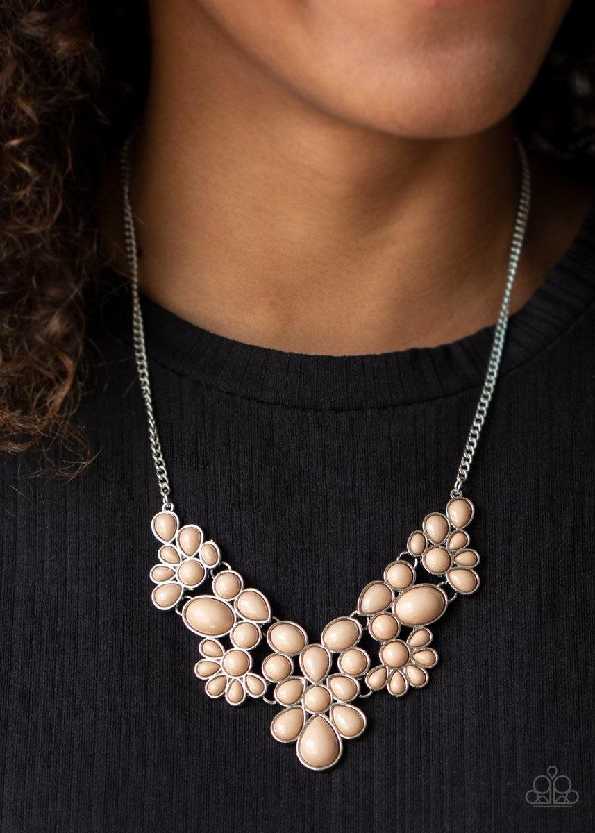Paparazzi Accessories Bohemian Banquet - Brown Featuring round, teardrop, and oval shapes, a shiny collection of dainty Lark beads delicately link into bubbly silver frames, creating a whimsical pop of color below the collar. Features an adjustable clasp