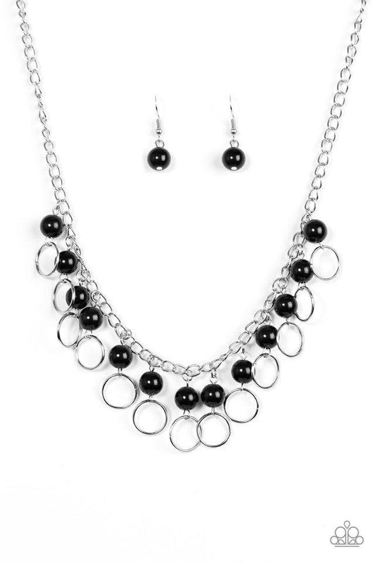 Paparazzi Accessories Run The Show - Black Shiny black beads trickle from the bottom of a glistening silver chain. Shimmery silver hoops cascade from the beads, creating a flirty fringe below the collar. Features an adjustable clasp closure. Sold as one i