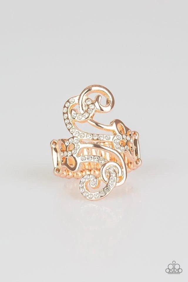 Paparazzi Accessories Waltzing Wonder ~Gold Encrusted in glassy white rhinestones, a sparkling ribbon intertwines with a smooth rose gold ribbon, swirling into a whirl of dainty butterfly frames. Features a stretchy band for a flexible fit. Sold as one in