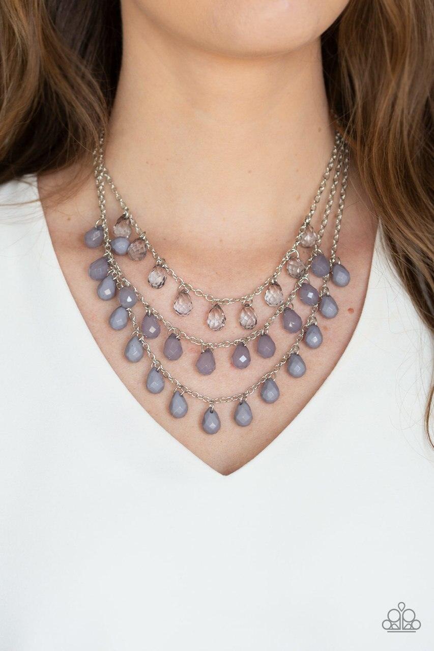 Paparazzi Accessories Melting Ice Caps - Silver Featuring sparkling faceted finishes, layers of smoky, opaque, and gray teardrop beads cascade below the collar for a whimsical ombre effect. Features an adjustable clasp closure. Sold as one individual neck
