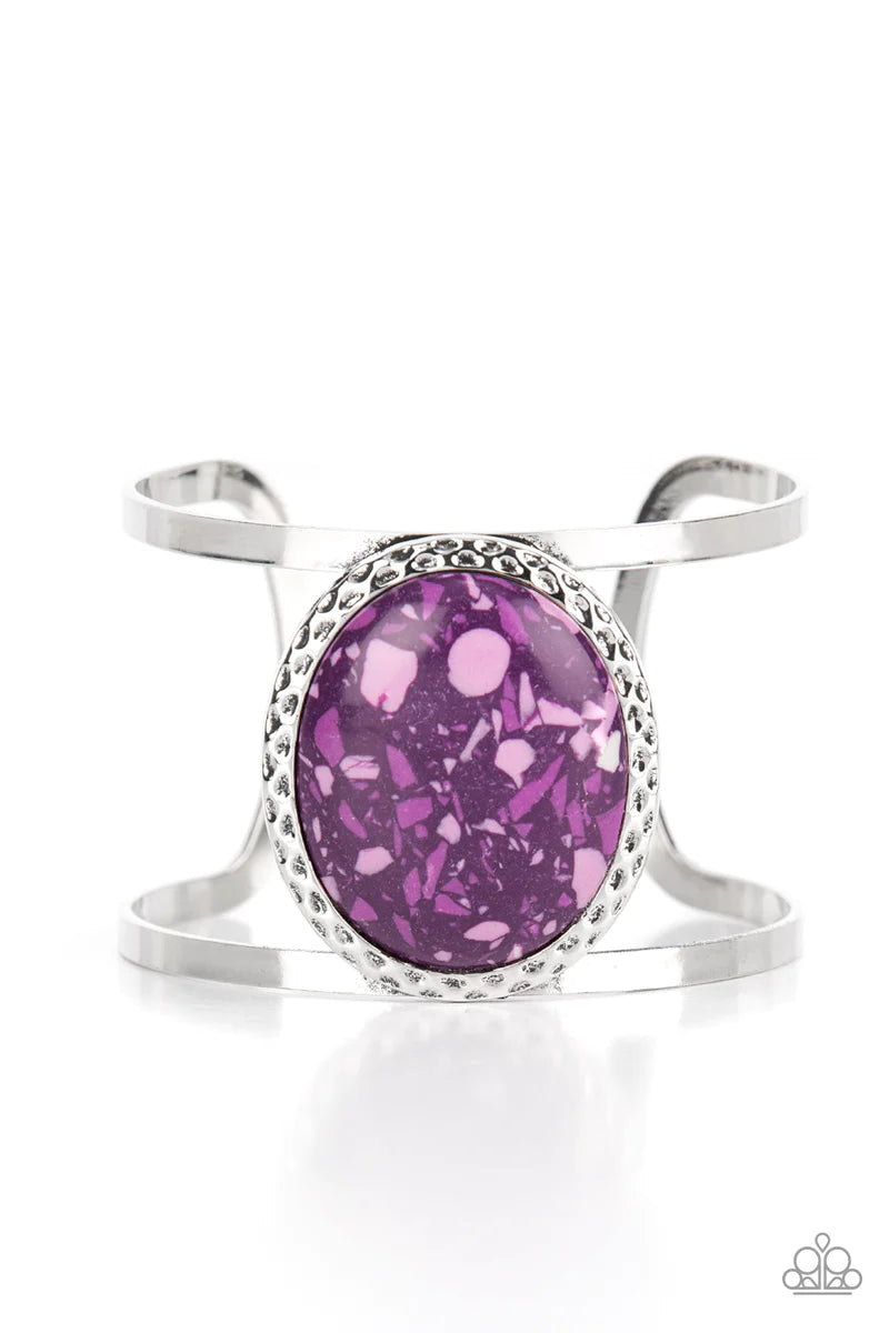 Paparazzi Accessories Tantalizing Terrazzo - Purple Featuring a colorful terrazzo finish, an oversized purple stone is pressed into the center of a hammered silver frame atop a layered silver cuff for a modern stone look. Sold as one individual bracelet.