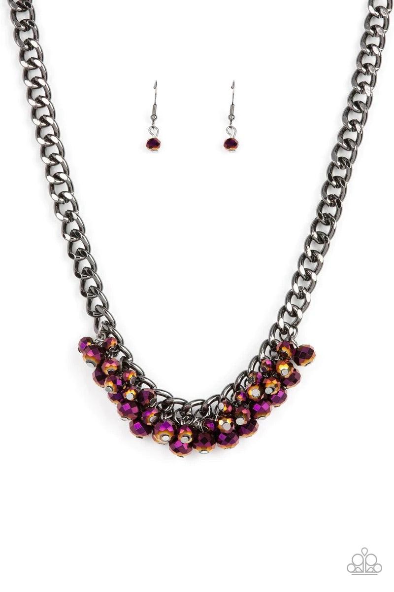 Paparazzi Accessories Galactic Knockout - Purple Flecked in oil spill iridescence, a faceted collection of metallic beads cluster along the center of a chunky gunmetal curb chain, creating a stellar fringe below the collar. Features an adjustable clasp cl