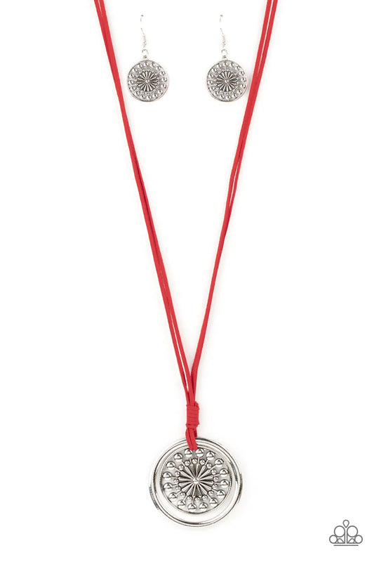 Paparazzi Accessories One MANDALA Show - Red A lengthened piece of red suede cording is knotted around a silver ring and a decorative studded silver frame, creating a whimsy mandala-like pendant. Features an adjustable clasp closure. Sold as one individua