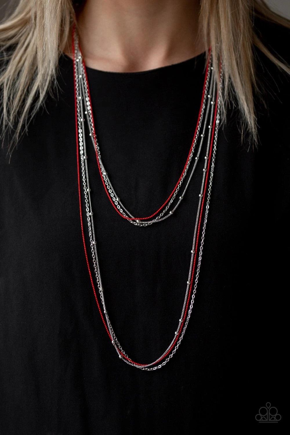 Paparazzi Accessories What A Colorful World ~Red Mismatched silver chains and silver satellite chains layer down the chest. Brushed in a fiery red finish, layers of ball-chain are added to the whimsical compilation for a colorful finish. Features an adjus