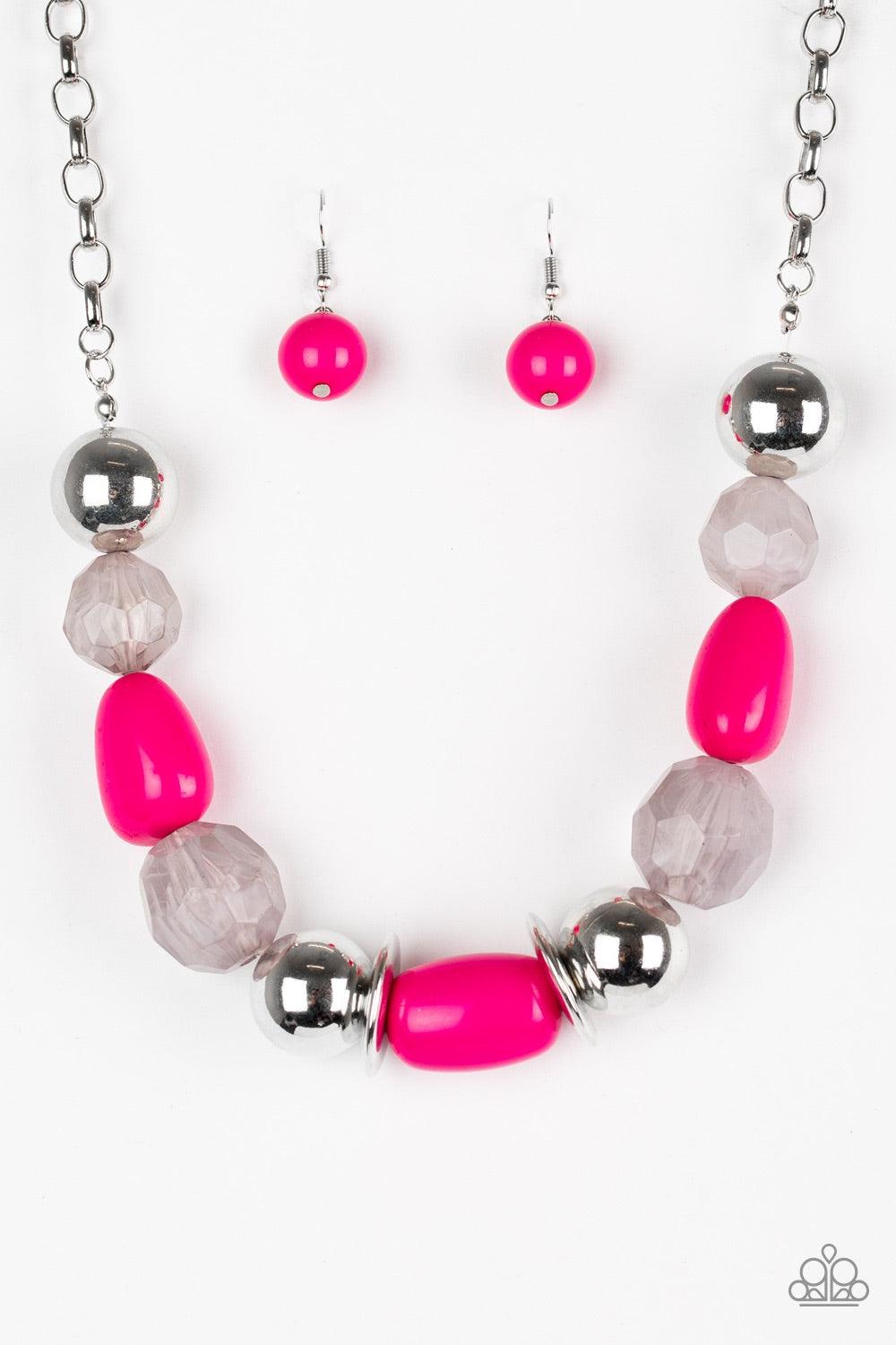 Paparazzi Accessories South Shore Sensation - Pink Dramatic silver, vibrant pink, and faceted cloudy beads are threaded along an invisible wire below the collar for a seasonal look. Features an adjustable clasp closure. Jewelry