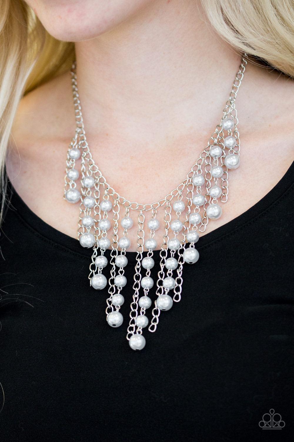 Paparazzi Accessories STUN Control - Silver Pearly silver beads trickle along strands of glistening silver chains, creating a tapered fringe below the collar. Features an adjustable clasp closure. Sold as one individual necklace. Includes one pair of matc