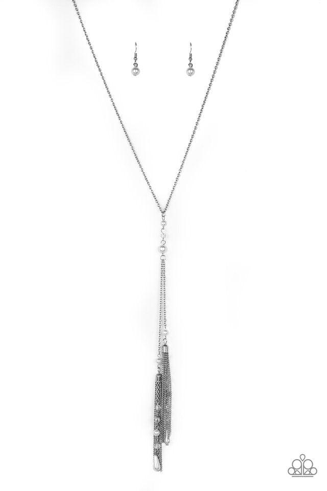 Paparazzi Accessories Timeless Tassels - White Dainty white pearls and sparkling white crystal-like beads gives way to two shimmery silver chain tassels. Infused with ornate silver beads, strands of matching beads trickle down the tassels for a refined fl