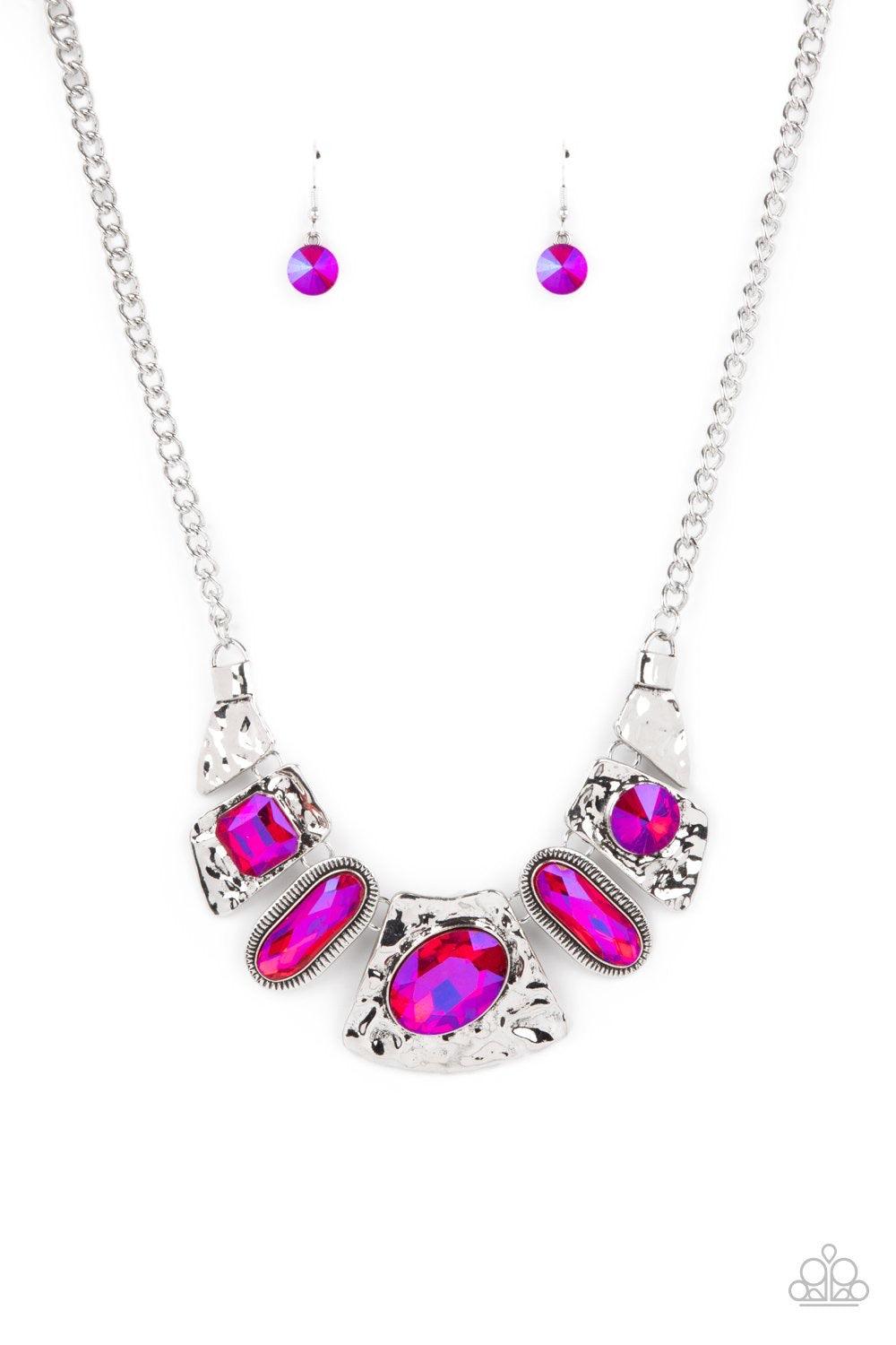 Paparazzi Accessories Futuristic Fashionista - Pink Featuring a stellar UV shimmer, mismatched iridescent Raspberry Sorbet gems adorn the front of hammered silver plates that abstractly connect below the collar for an out-of-this-world sparkle. Features a