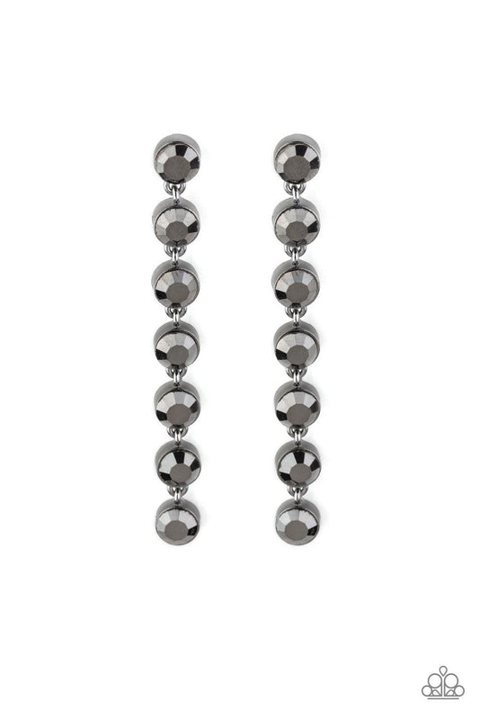 Paparazzi Accessories Dazzling Debonair - Black Featuring sleek gunmetal fittings, a collection of oversized hematite rhinestones drip from the ear for a glamorous look. Earring attaches to a standard post fitting. Jewelry