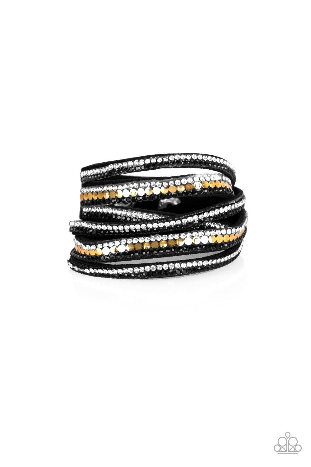 Paparazzi Accessories Rock Star Attitude - Gold Encrusted in rows of glittery black and white rhinestones and flat gold studs, three strands of black suede wrap around the wrist for a sassy look. The elongated band allows for a trendy double wrap around t