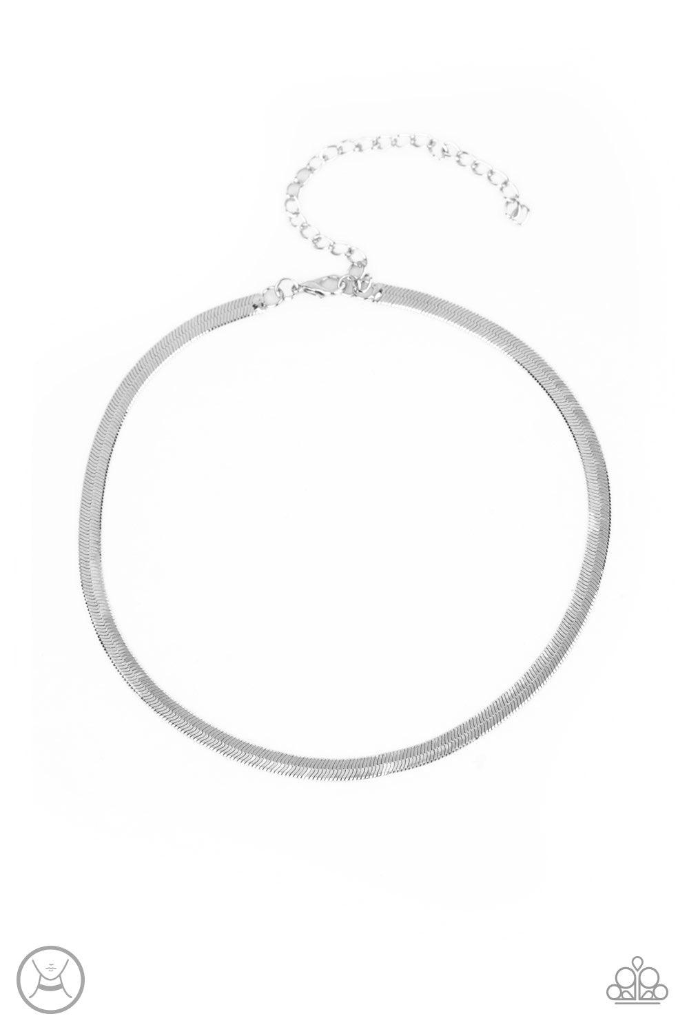 Paparazzi Accessories Serpentine Sheen -Silver A flat row of glistening silver snake chain wraps around the neck for a sleek shimmer. Features an adjustable clasp closure. Jewelry