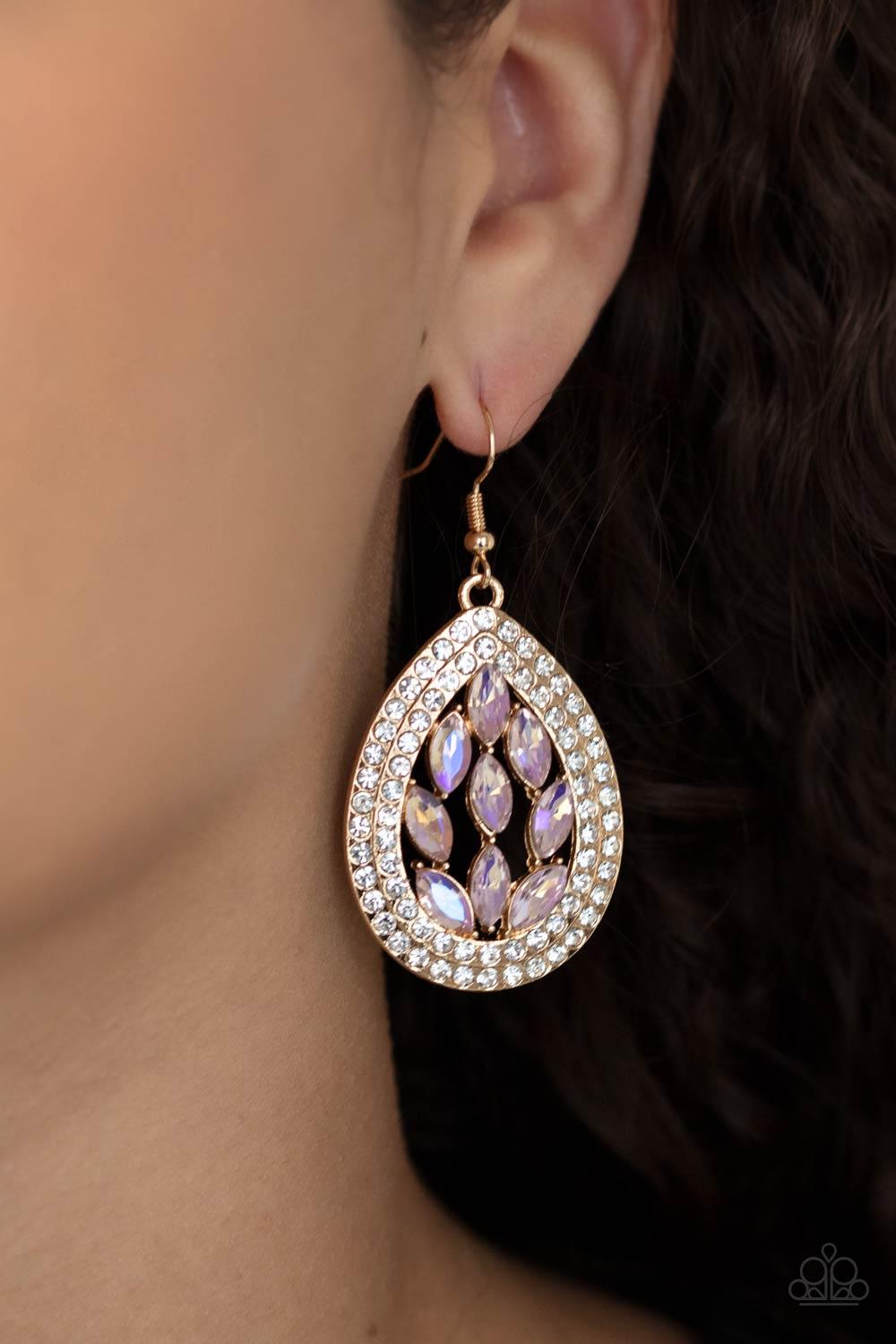 Paparazzi Accessories Encased in Elegance - Gold Iridescent marquise cut rhinestones collect inside two borders of glassy white rhinestones, coalescing into a sparkly teardrop. Earring attaches to a standard fishhook fitting. Sparkly and Bright these eye