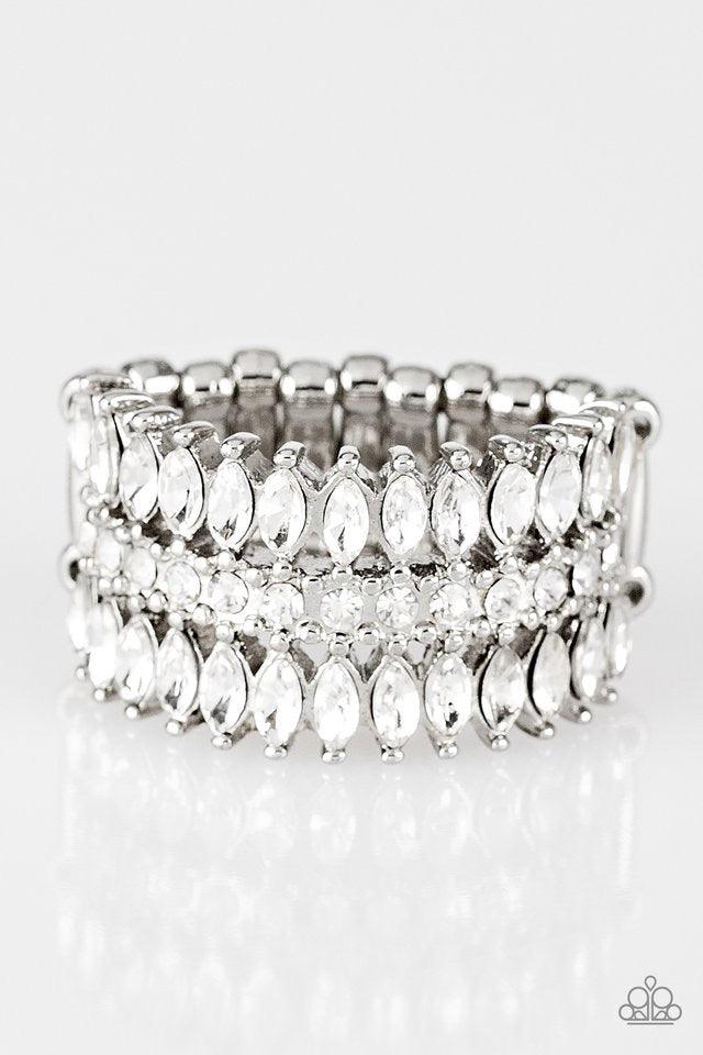 Paparazzi Accessories Treasury Fund - White Featuring refined marquise cuts, glittery white rhinestones flare from a center of glassy white rhinestones, creating a regal band across the finger. Features a stretchy band for a flexible fit. Jewelry