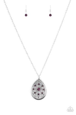 Paparazzi Accessories I Am Queen - Purple A dramatic teardrop pendant swings from the bottom of an elongated silver chain, elegantly slimming the torso. Glittery purple rhinestones are sprinkled along the pendant as silver filigree dances across the cente