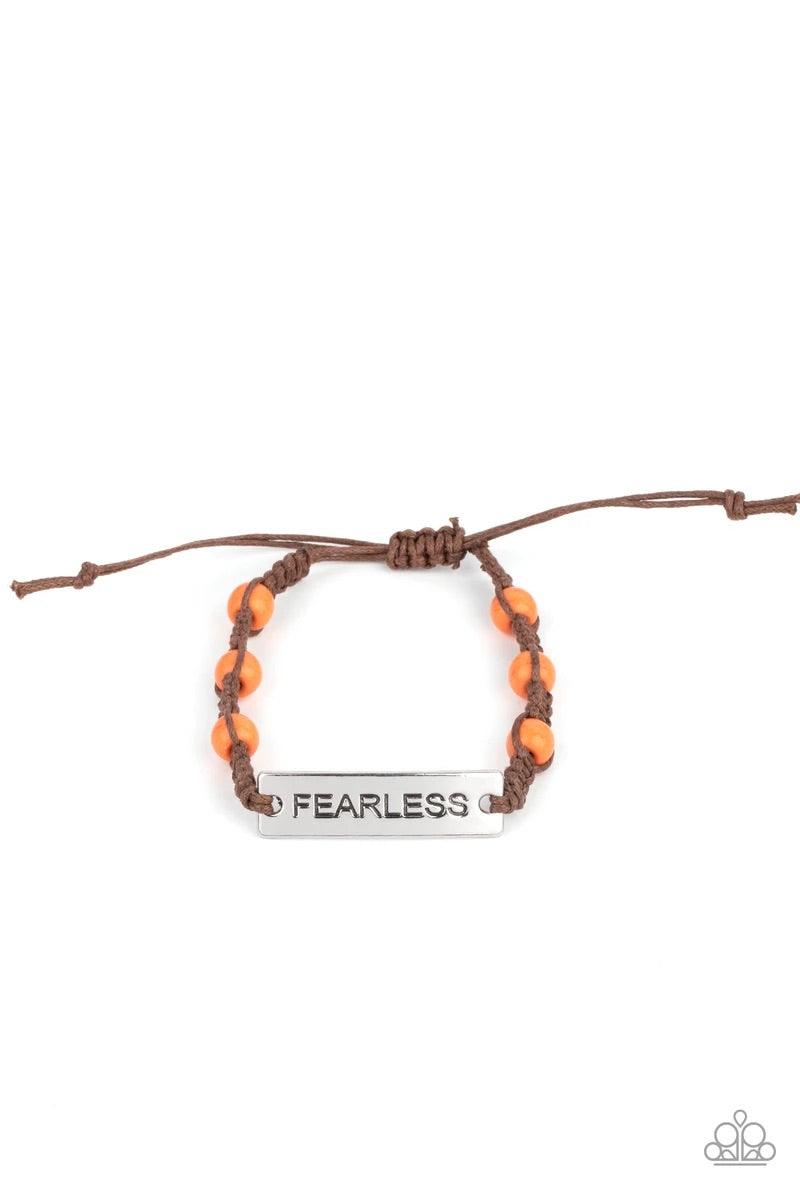 Paparazzi Accessories Conversation Piece - Orange A silver plate engraved with the word "FEARLESS" is centered between brown knotted cording. Accented with bright orange stone beads, it slides around the wrist for an unconventional conversation starter. F