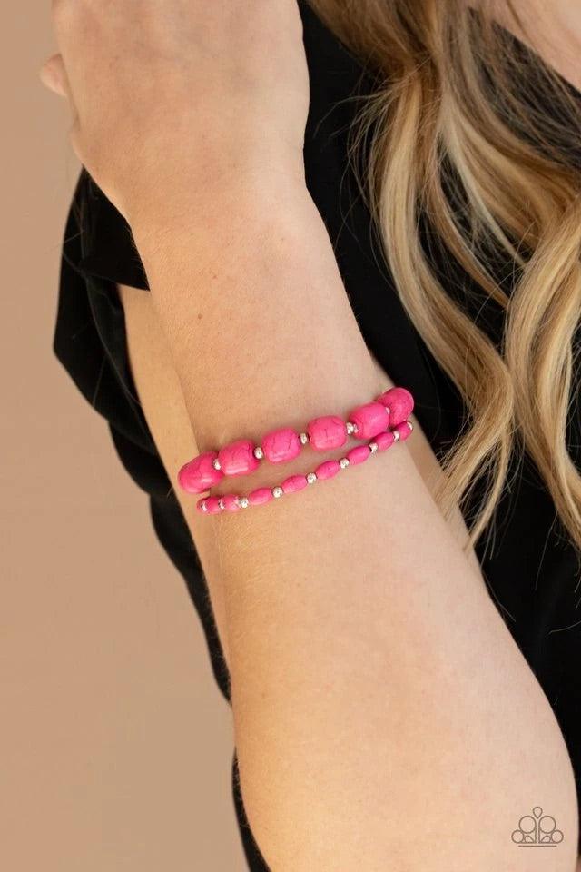Paparazzi Accessories Colorfully Country - Pink Dainty silver beads and mismatched pink stone beads are threaded along stretchy bands around the wrist, creating vivacious layers. Jewelry
