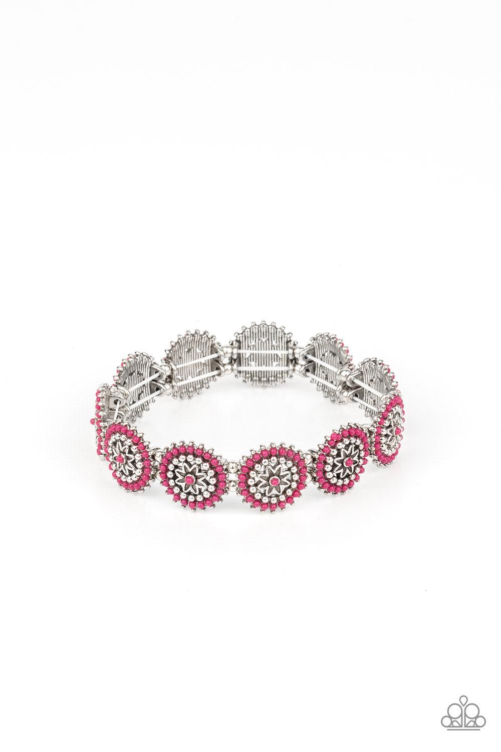 Paparazzi Accessories Bohemian Flowerbed - Pink Dotted in dainty Pink Peacock beads, studded silver floral frames are delicately threaded along stretchy bands around the wrist for a whimsically seasonal look. Sold as one individual bracelet. Jewelry