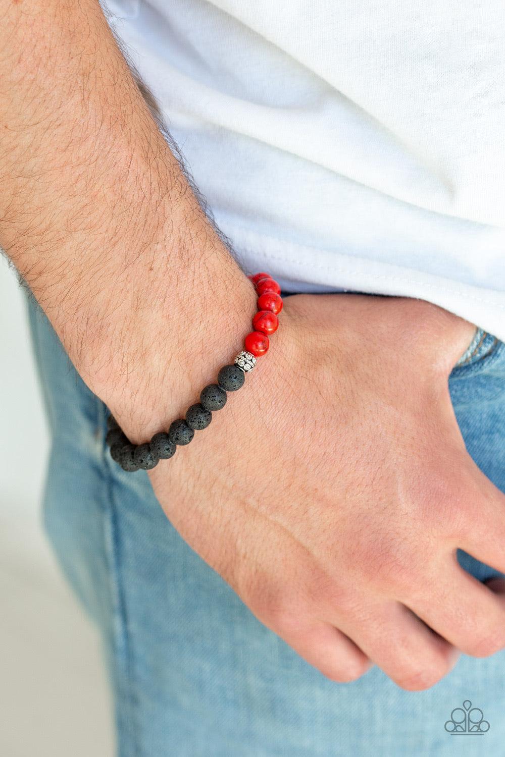 Paparazzi Accessories Fortune - Red Infused with dainty silver accents, a collection of black lava rock and fiery red stone beads are threaded along a stretchy band around the wrist for a seasonal style. Jewelry