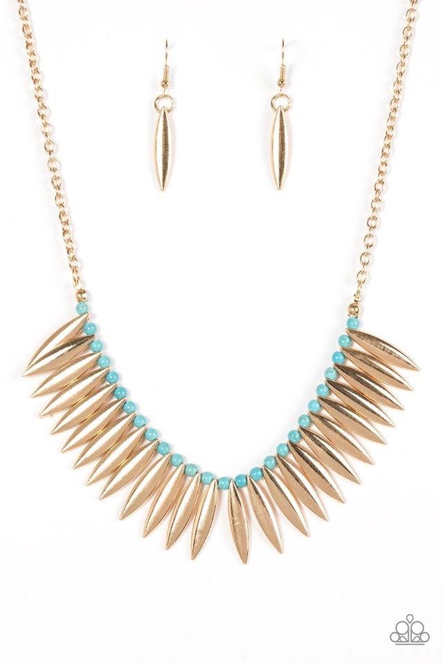 Paparazzi Accessories Tameless Tigress - Gold Shiny gold frames alternate with refreshing turquoise beads along a skinny wire, creating a fierce fringe below the collar. Features an adjustable clasp closure. Jewelry