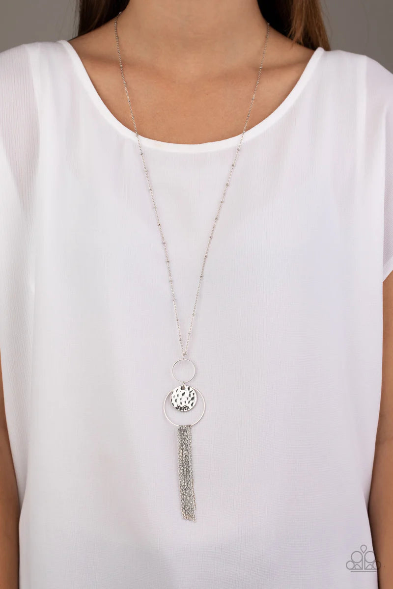 Paparazzi Accessories Faith Makes All Things Possible - Silver A delicately hammered silver disc is stamped in the inspirational word, "faith" and suspended from a double-hooped pendant at the bottom of an elongated silver satellite chain. A silver tassel