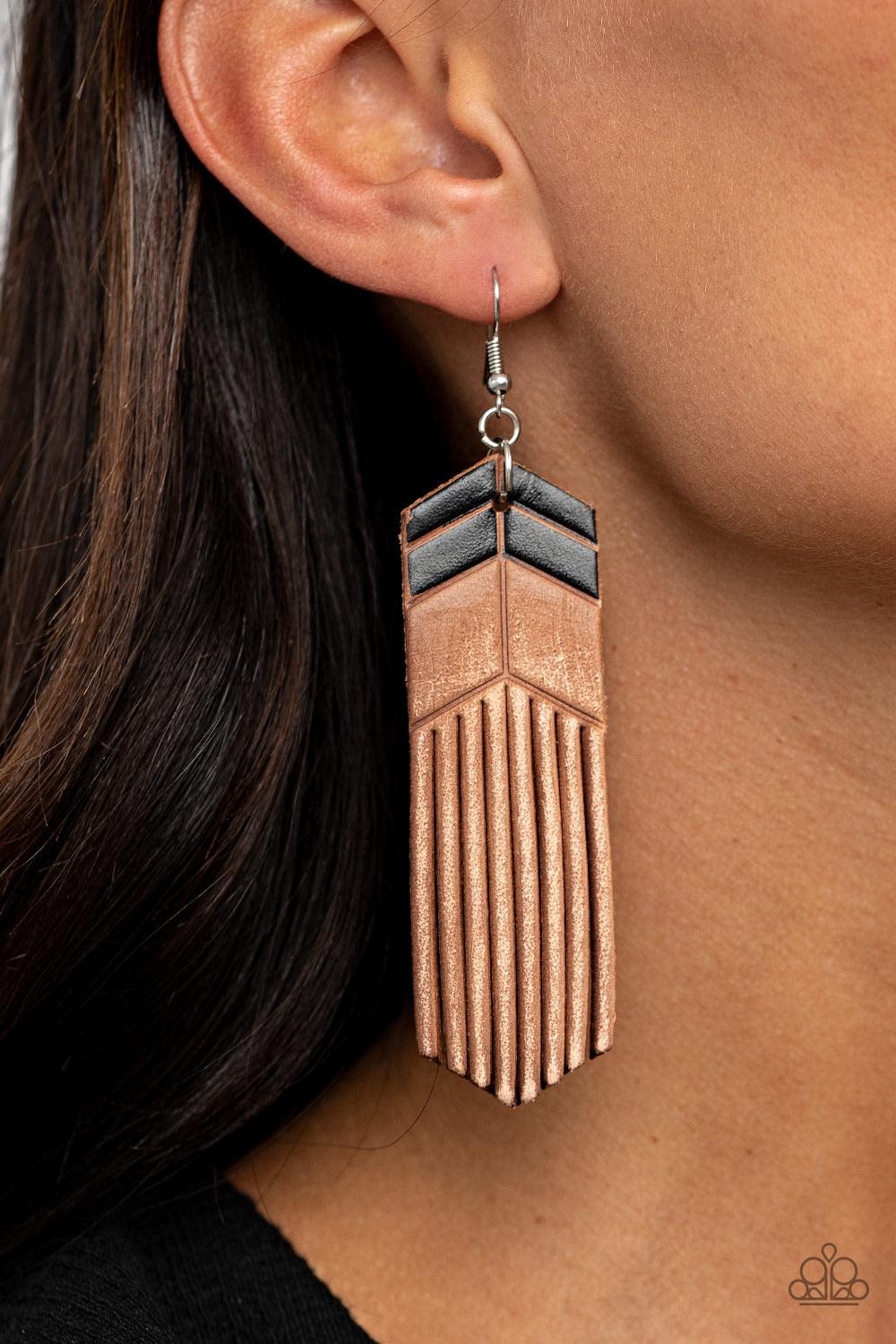 Paparazzi Accessories Desert Trails - Black Painted in black chevron-like details, a distressed leather frame is spliced into tasseled ends, creating an earthy fringe. Earring attaches to a standard fishhook fitting. Sold as one pair of earrings. Jewelry