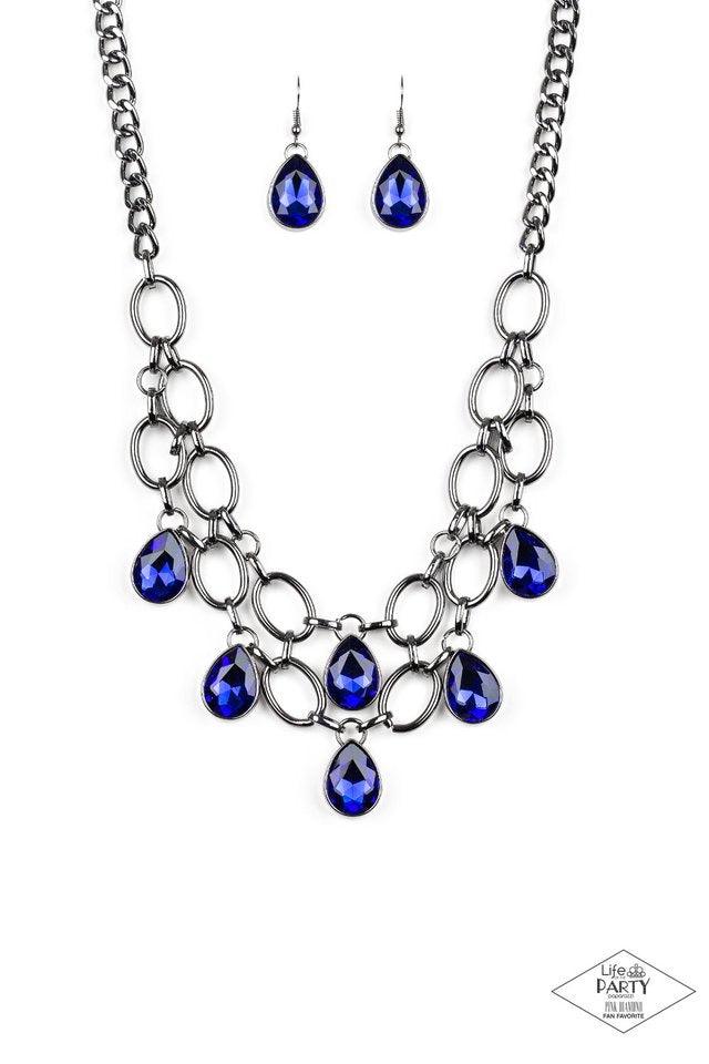 Paparazzi Accessories Show-Stopping Shimmer - Blue Joined by dainty gunmetal links, two rows of dramatic gunmetal chain layer below the collar in a fierce fashion. Glittery blue teardrop gems drip from the glistening layers, adding a timeless shimmer to t