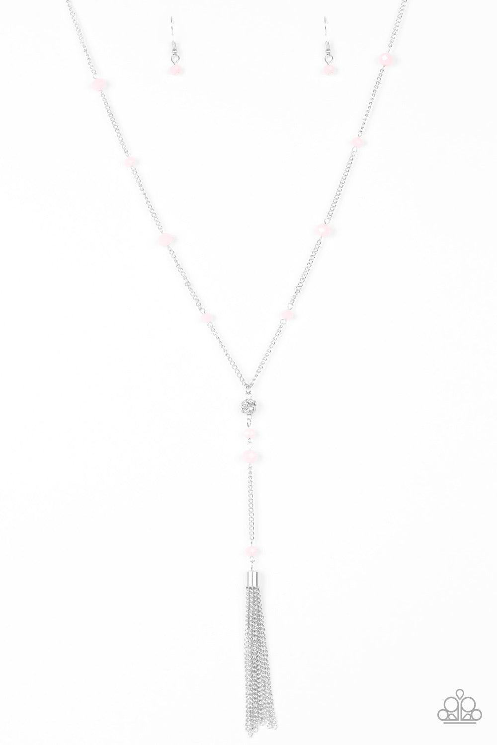 Paparazzi Accessories Out All Night - Pink Pink crystal-like beads trickle down a shimmery silver chain. Encrusted in white rhinestones, a silver bead gives way to a chain extension dotted in matching crystal beads for an elegant finish. Features an adjus