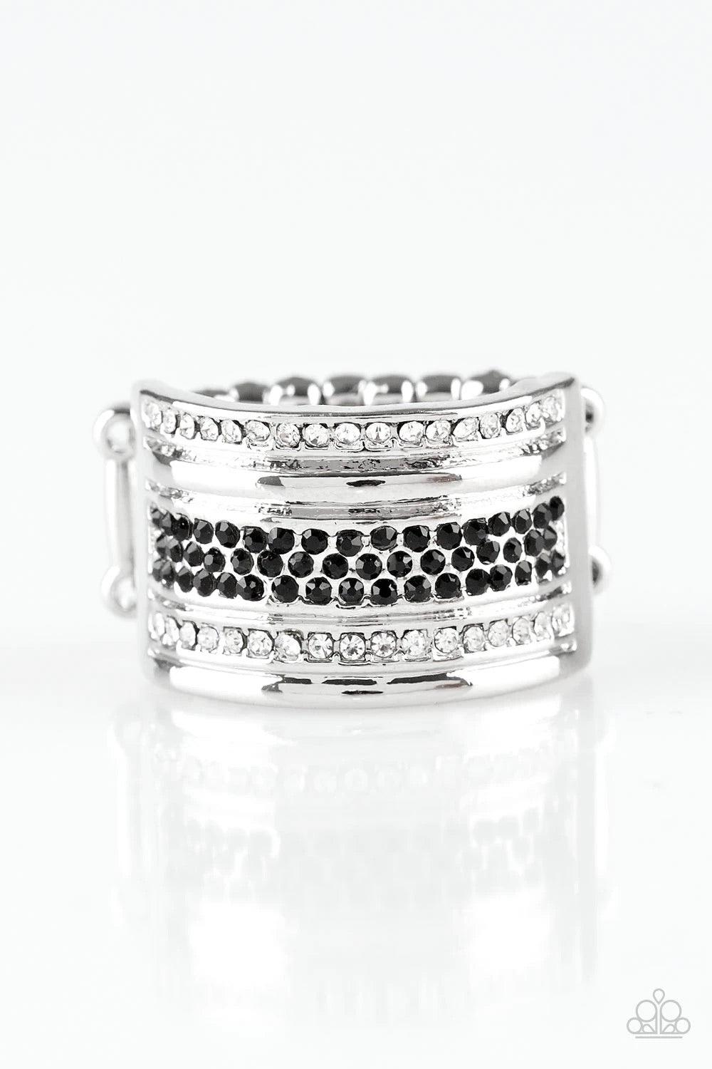 Paparazzi Accessories Top Dollar Drama - Black Black and white rhinestone encrusted bands stack across the finger for a glamorous look. Features a stretchy band for a flexible fit. Sold as one individual ring. Jewelry