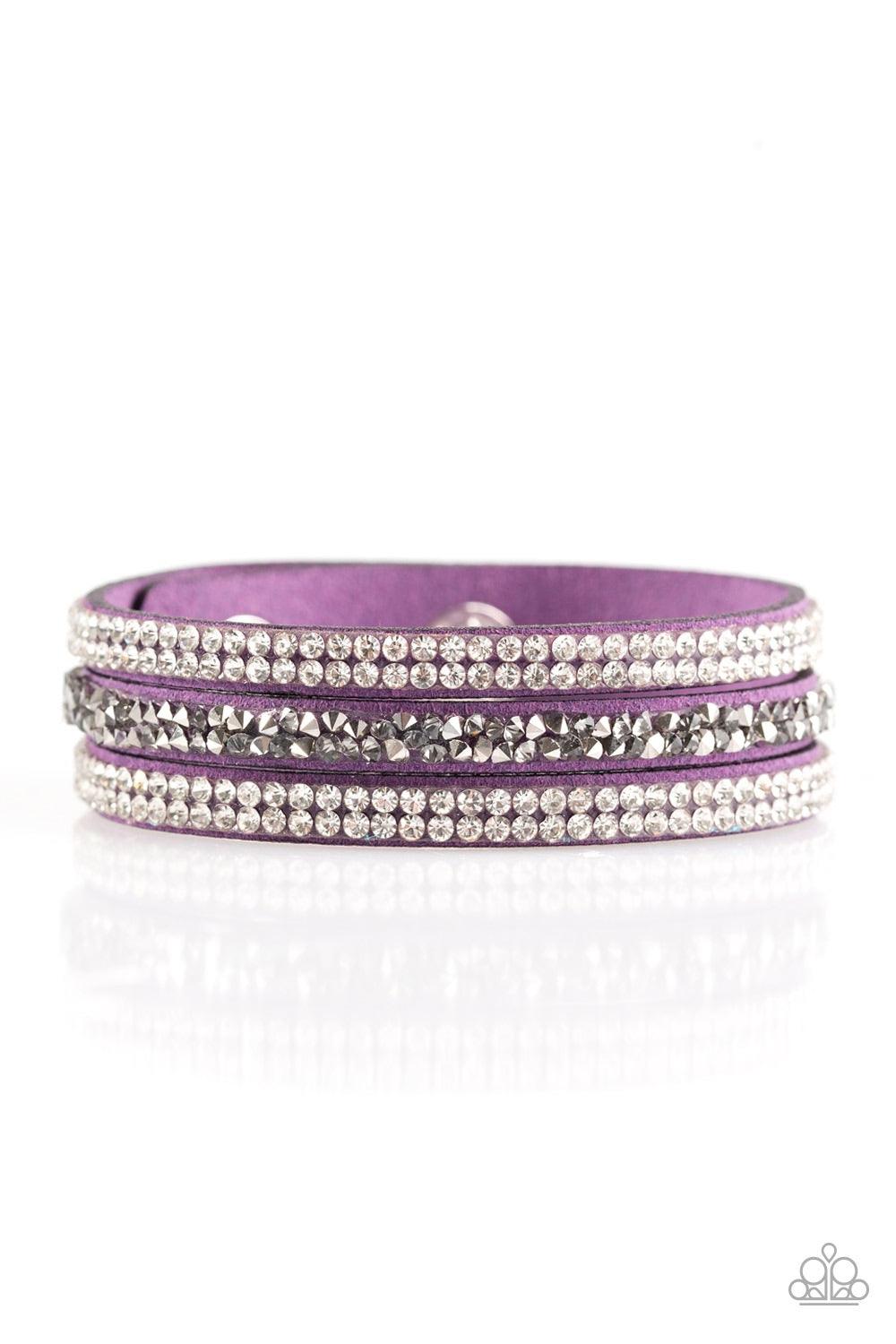 Paparazzi Accessories Mega Glam - Purple Glittery white, smoky, and glassy hematite rhinestones are sprinkled along three strands of refreshing purple suede for a glamorous look. Features an adjustable snap closure. Jewelry