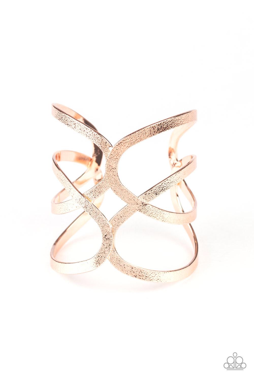 Paparazzi Accessories Crossing The Finish Line - Rose Gold Delicately hammered in endless shimmer, glistening rose gold bars crisscross across the wrist, coalescing into a bold cuff. Jewelry