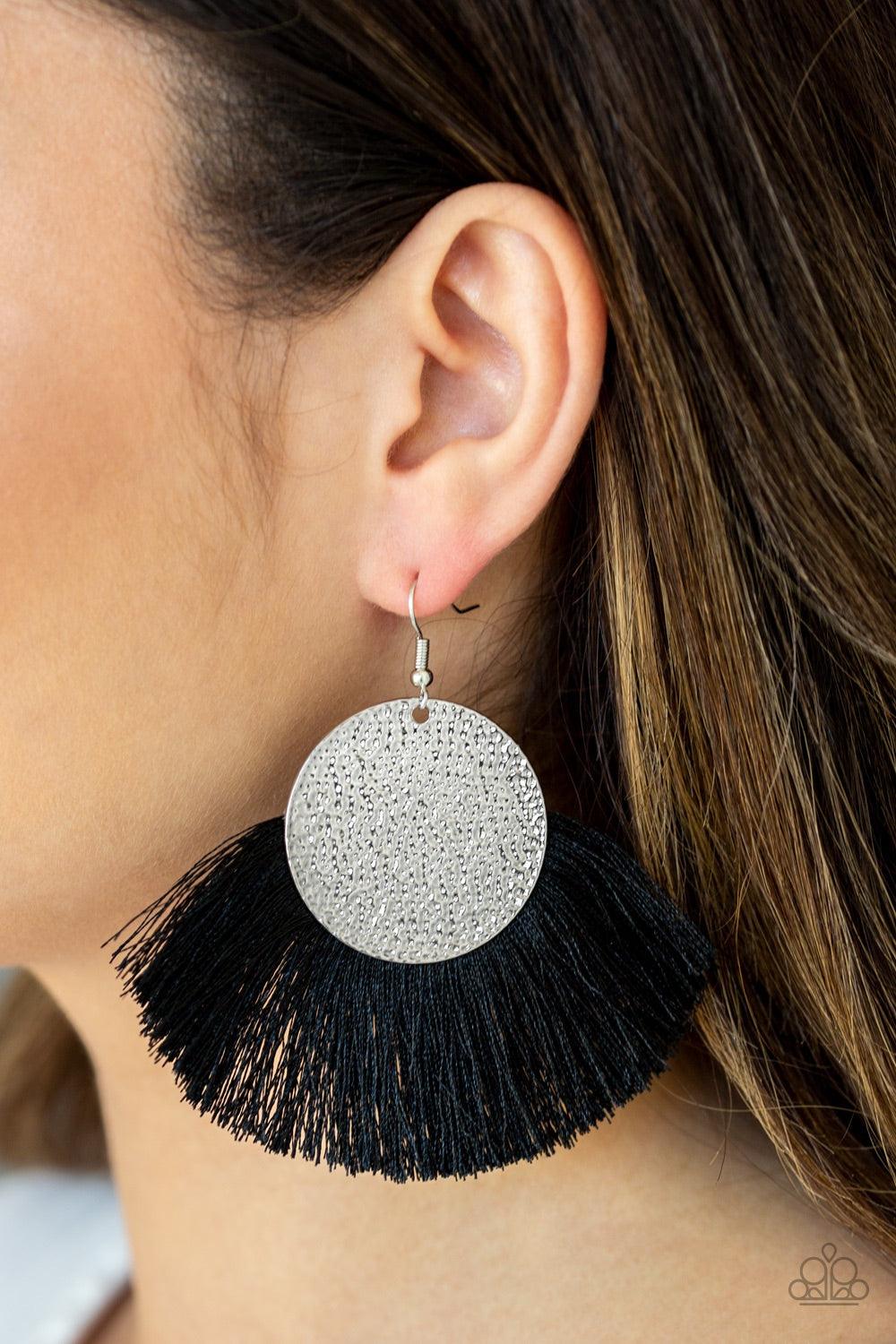 Paparazzi Accessories Foxtrot Fringe - Black A fan of shiny black thread flares out from the bottom of a hammered silver disc, creating a foxy fringe. Earring attaches to a standard fishhook fitting. Jewelry
