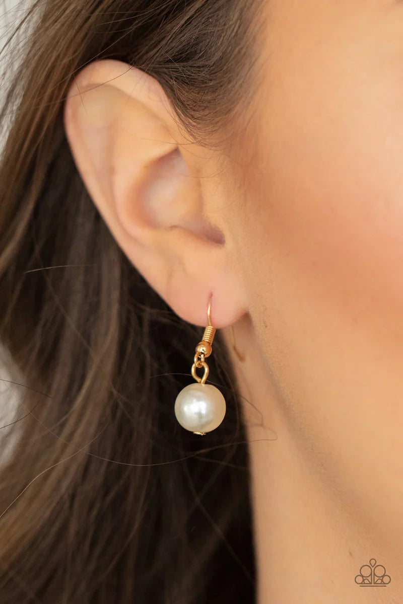 Paparazzi Accessories Nautical Novelty - Gold Classic white pearls and faceted gold beads alternate along an invisible wire below the collar, creating a timeless twist. Features an adjustable clasp closure. Sold as one individual necklace. Includes one pa