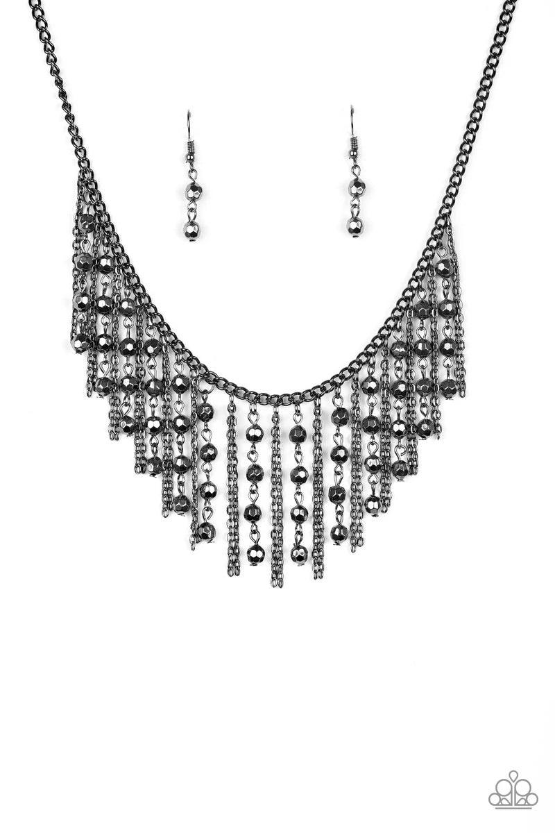 Paparazzi Accessories Rebel Remix - Black Strands of faceted gunmetal beads and glistening gunmetal chains stream from a matching gunmetal chain, creating an edgy fringe below the collar. Features an adjustable clasp closure. Sold as one individual neckla